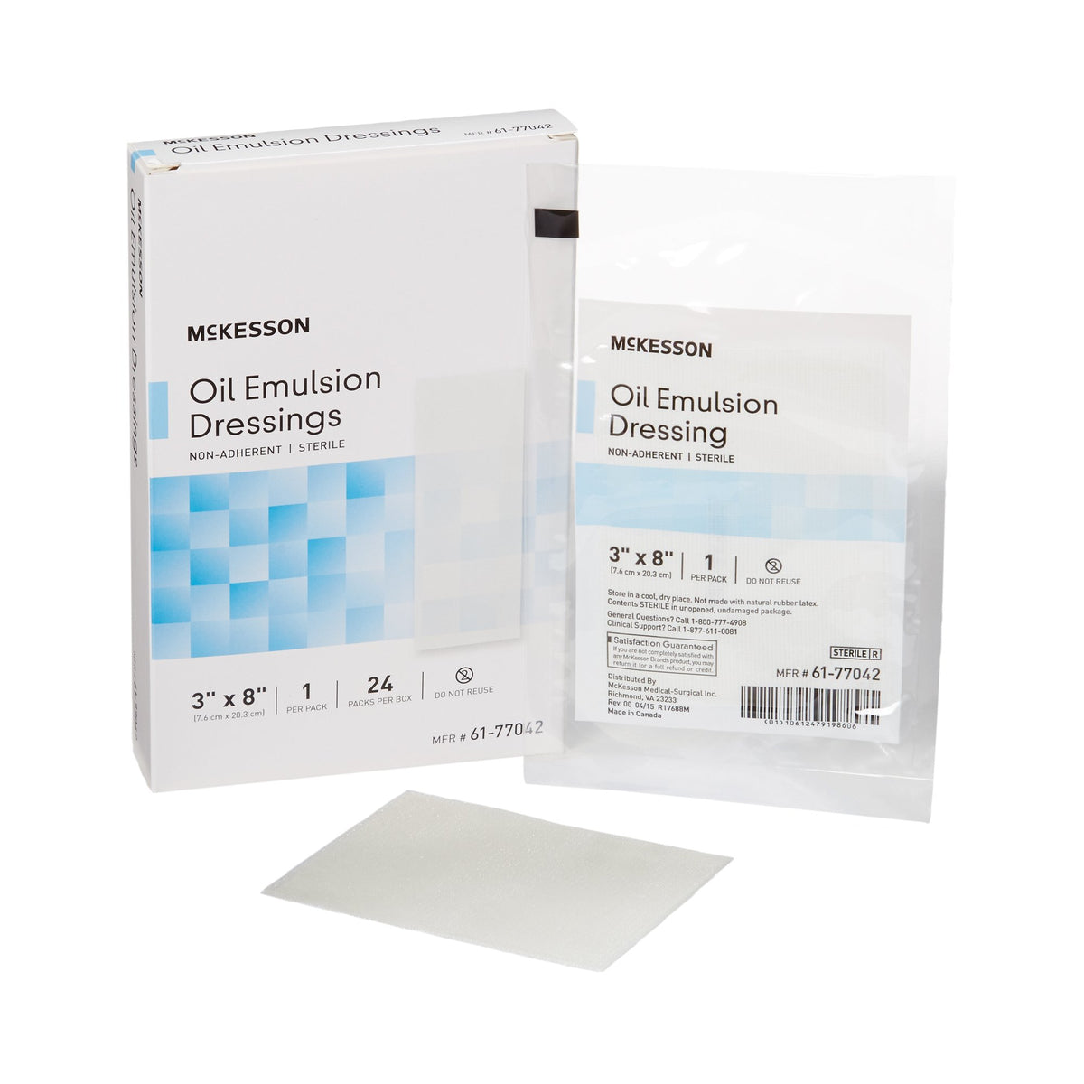 Oil emulsion impregnated dressing box, individual sterile packet, and unwrapped dressing pad displayed on white background