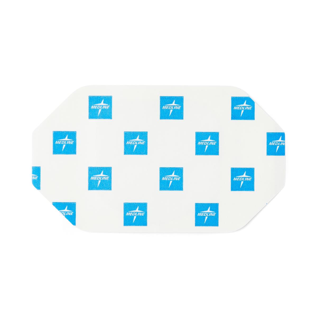 Transparent film dressing with white backing printed with repeating blue Medline logos, shown on white background
