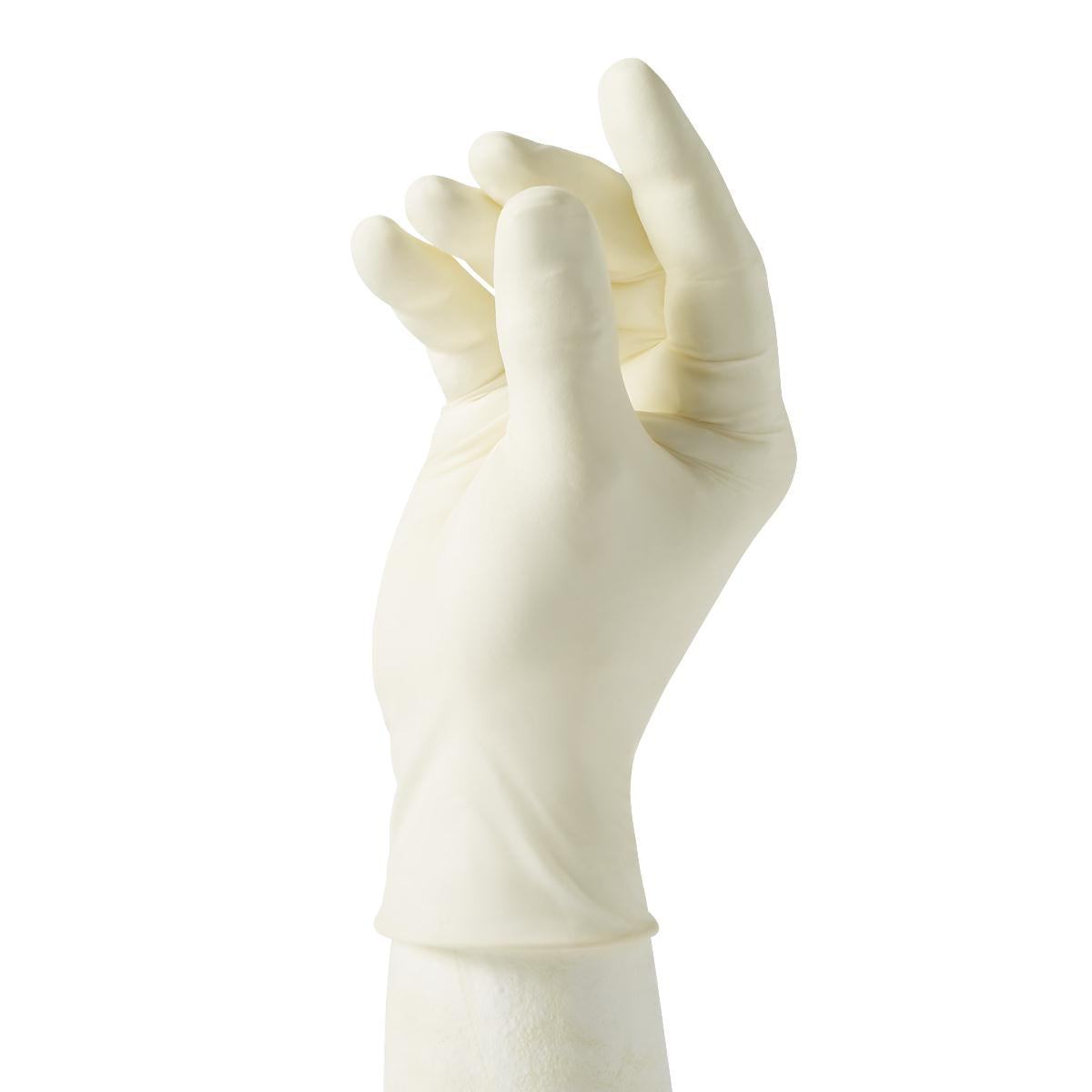 Latex exam glove in cream white worn on a raised hand against a white background, showing a slightly curled finger position