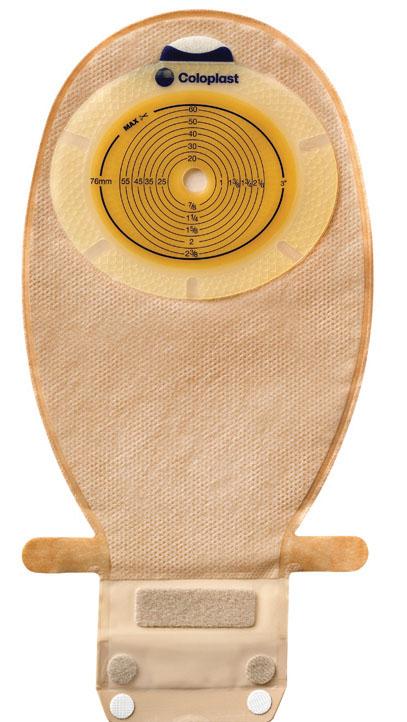 One-piece drainable ostomy pouch with circular cut-to-fit wafer, sizing guide, and velcro closure strip, beige fabric backing
