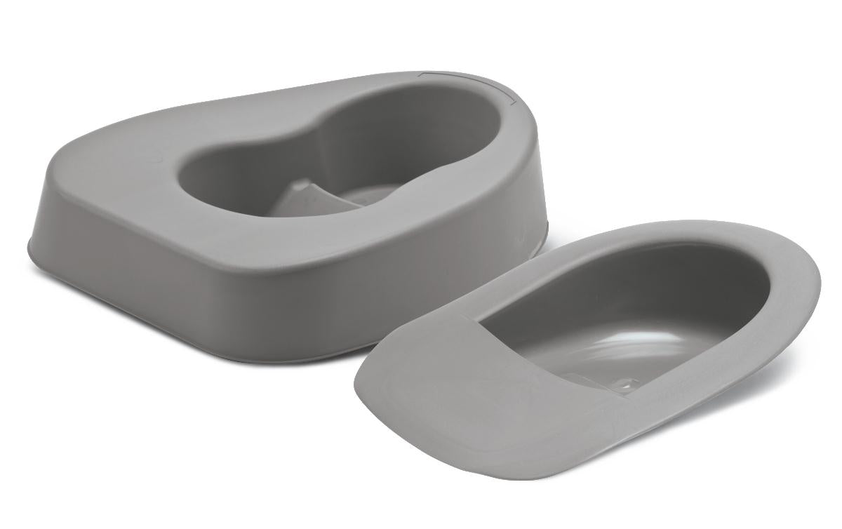 Bariatric fracture bedpan and standard fracture bedpan side by side, both gray plastic with low-profile contoured design
