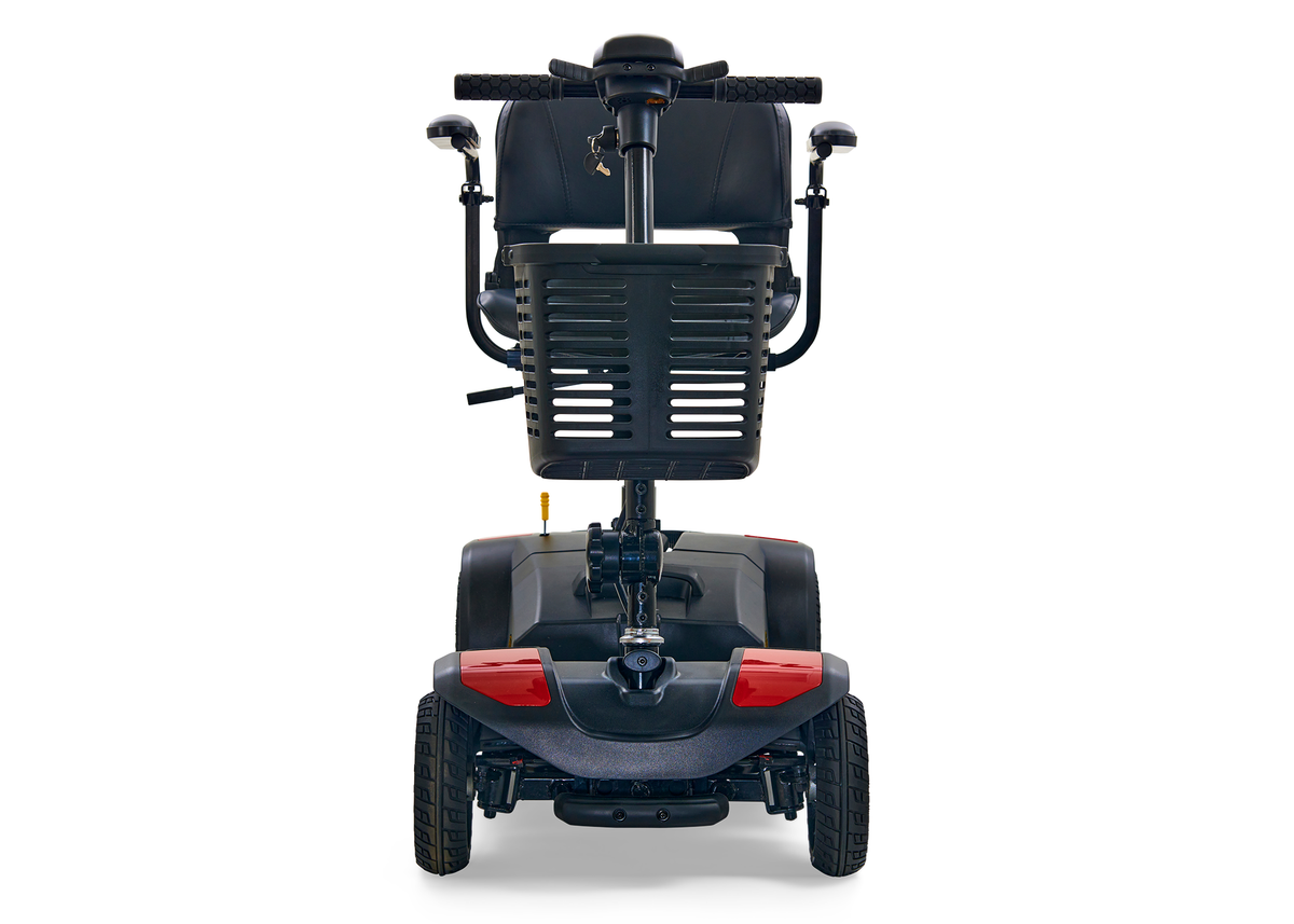 Power mobility scooter with black seat and armrests, red and black body panel, four wheels, and tiller handlebar, rear view