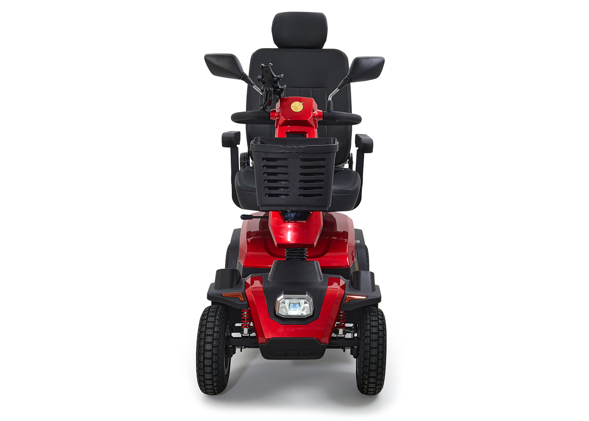 4-wheel heavy-duty mobility scooter in red with black captain's seat, side mirrors, front basket, headlight, and large