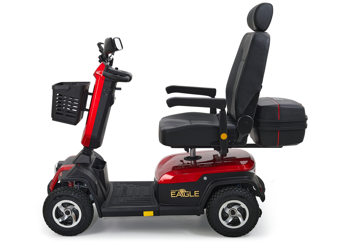 4-wheel heavy-duty mobility scooter in red with black captain seat, front basket, rear storage, and large all-terrain tires