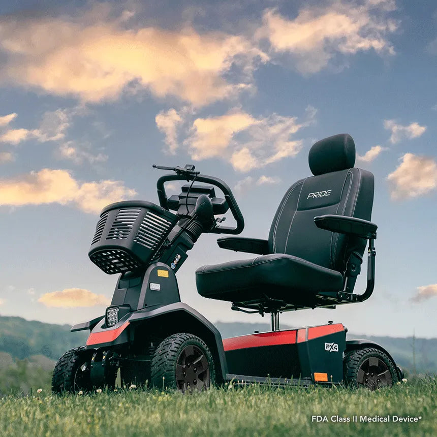 Pride PX4 heavy-duty 4-wheel mobility scooter in black and red with large tires, padded seat, and front basket, outdoors on