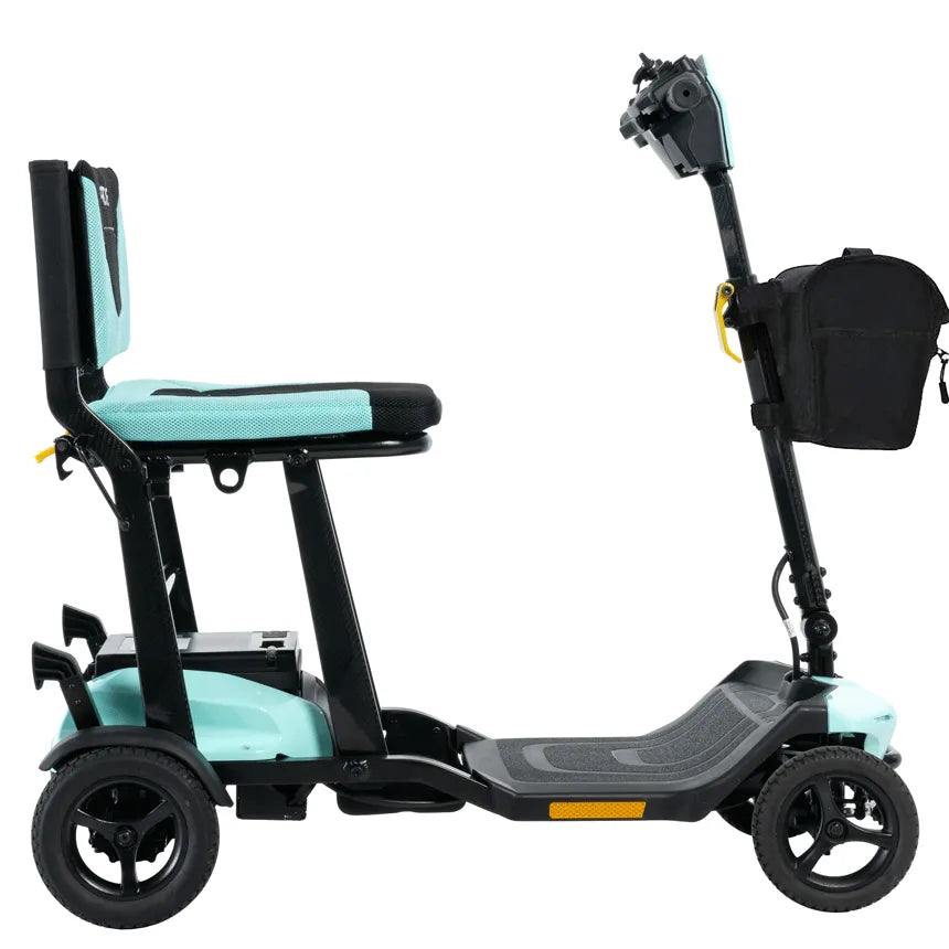 Mobility scooter in mint green and black with mesh seat, folding tiller, front basket, and four wheels, shown from the side