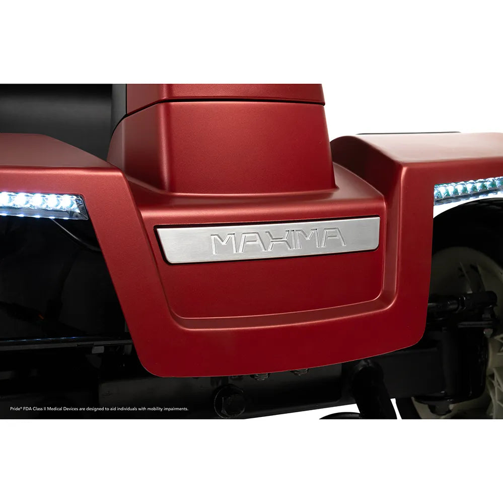 Power scooter body panel in red with brushed metal Maxima nameplate badge and LED accent lighting