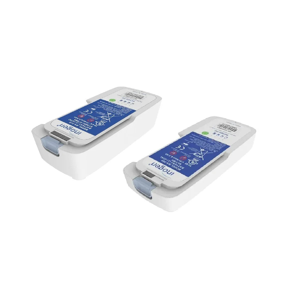 Inogen portable oxygen concentrator replacement batteries, two white rectangular units with blue labeled undersides, shown