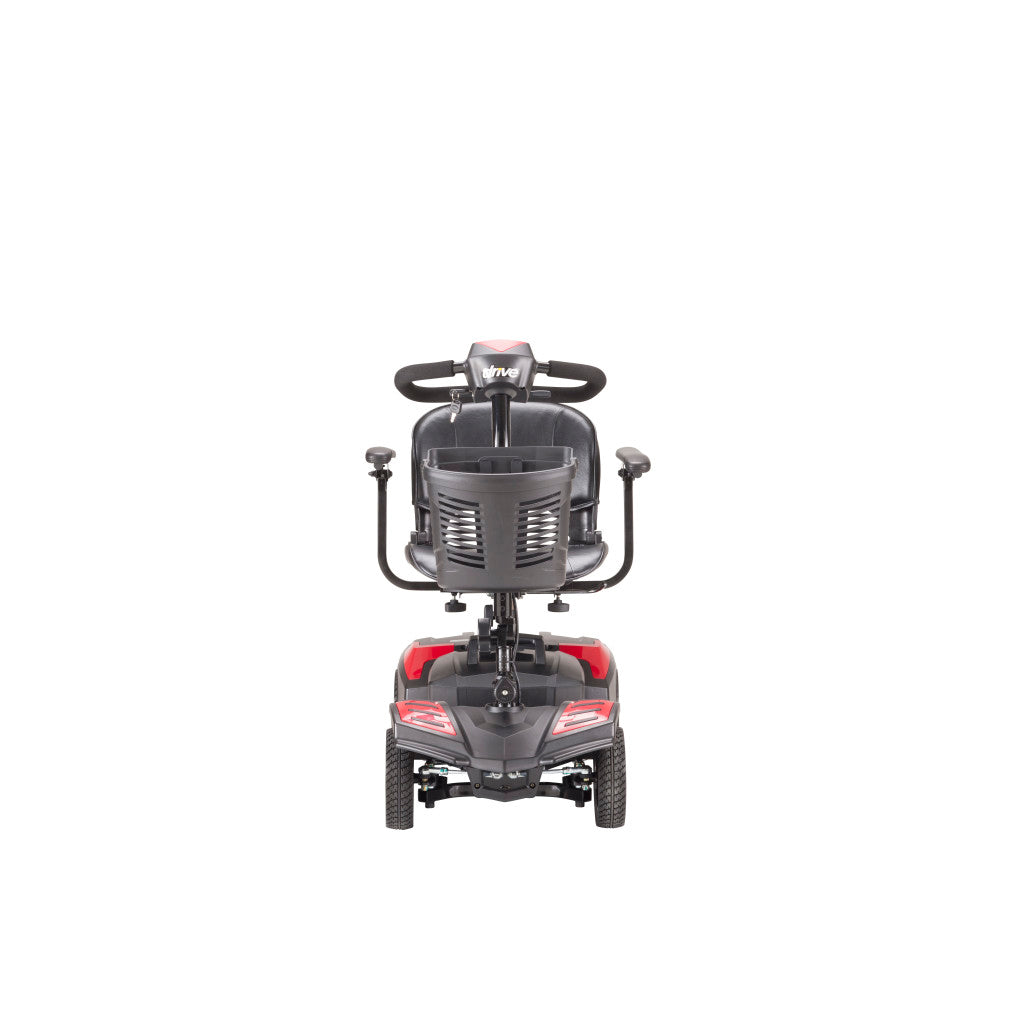 Power mobility scooter with red and gray body, padded seat, adjustable armrests, tiller steering, and four wheels, front view