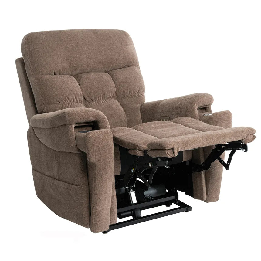Power lift recliner in taupe fabric with tufted cushioning, extended footrest, and visible lift mechanism underneath