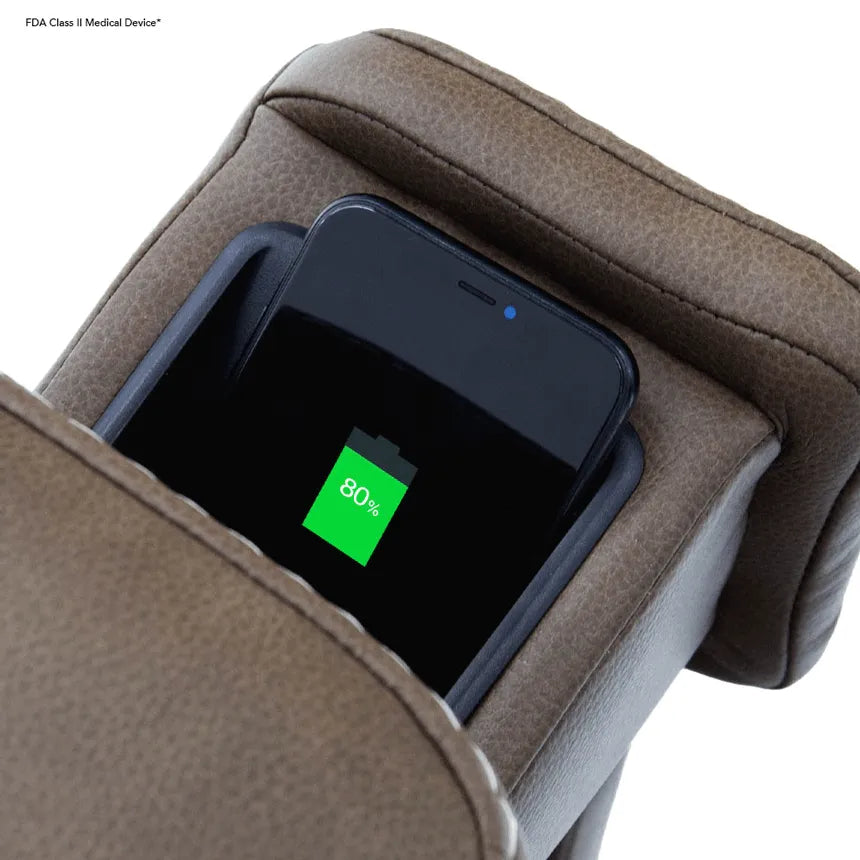 Lift recliner armrest with built-in wireless charging pad holding a smartphone displaying 80% battery charge