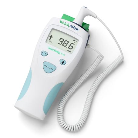 Welch Allyn SureTemp Plus electronic oral thermometer with digital display showing 98.6°F and attached probe on coiled cord