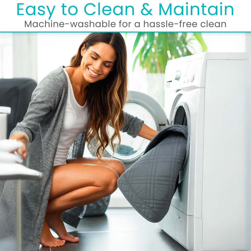 Lift chair cover being placed into a front-load washing machine by a smiling woman, shown in gray quilted fabric