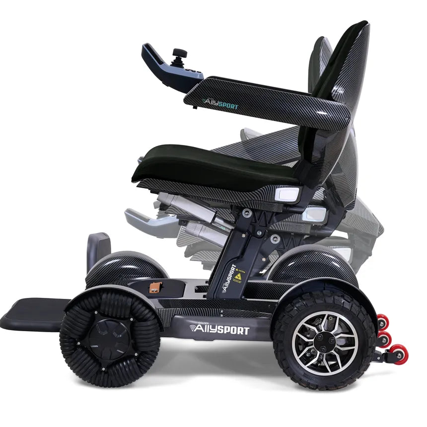 Power wheelchair with carbon fiber finish, joystick controller, elevated seat, footrest, and all-terrain wheels, shown from