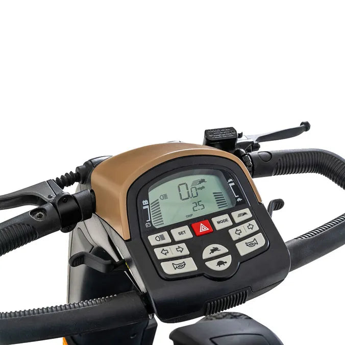 Power scooter tiller console with LCD display, speed readout, battery indicator, and control buttons in desert sand and