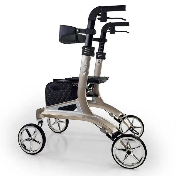 Rollator walker in champagne finish with four spoke wheels, loop hand brakes, and quilted black underseat bag, side view