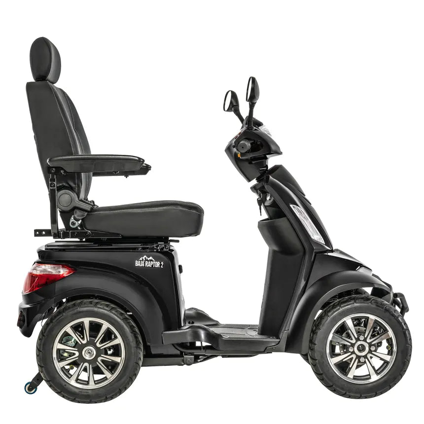 Pride Mobility Baja Raptor 2 four-wheel mobility scooter in black, side view, with high-back seat, armrests, and large tires