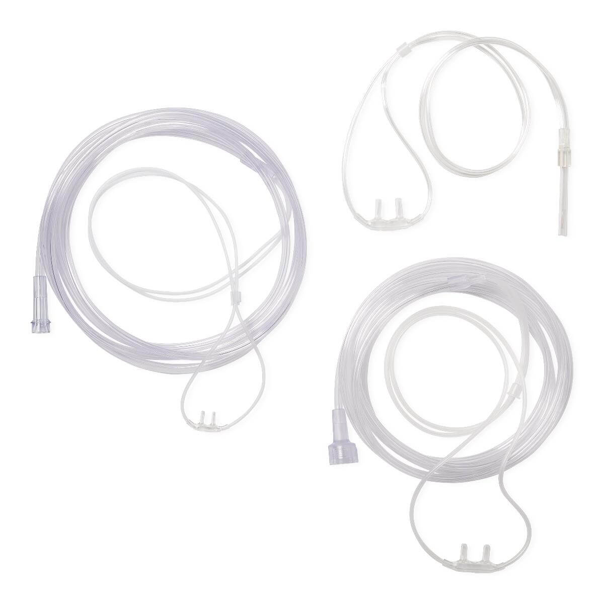 Nasal cannulas with soft-touch clear tubing coiled on white background, showing two full-length and one shorter set with