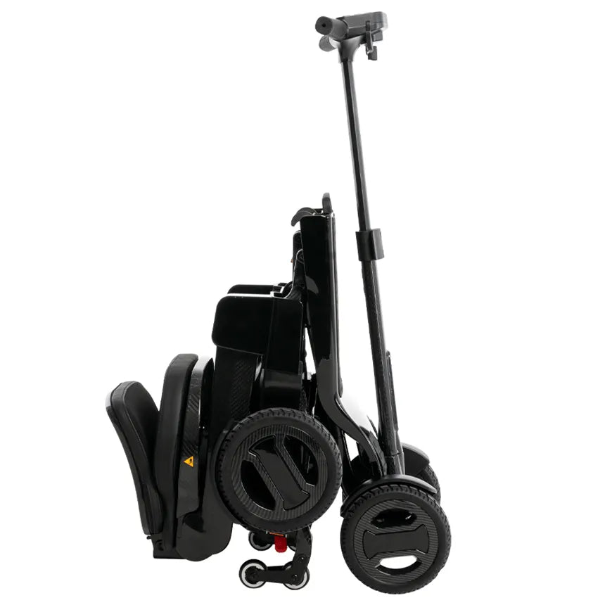 Folding power scooter in collapsed position with extended carry handle, shown from the side in all-black finish