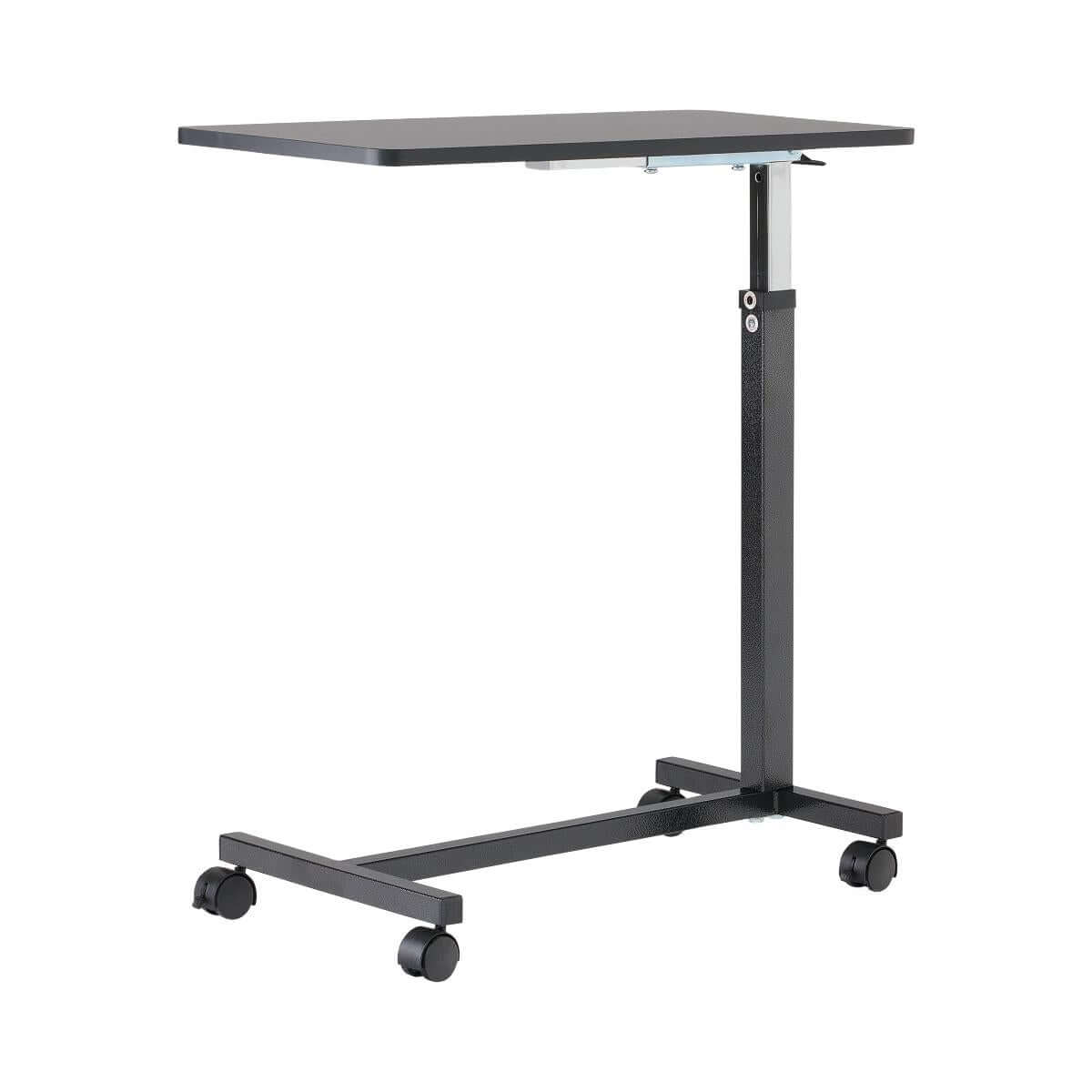 Overbed table with black rectangular top, adjustable height steel post, H-base frame, and four swivel casters
