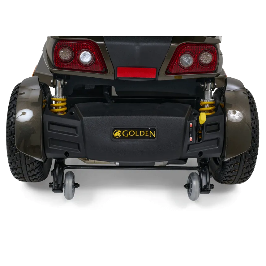 Power scooter rear view showing Golden branding, dual red taillights, yellow coil suspension, and large rear tires