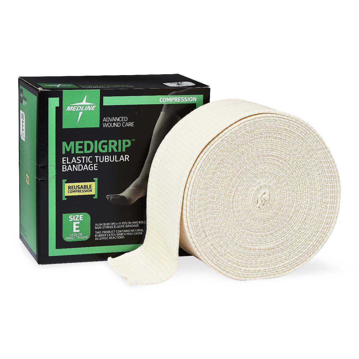 Elastic tubular bandage roll in cream beside its black and green box, Size E for legs or small thighs