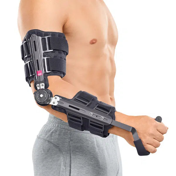Epico ROM elbow brace with hinged metal frame, adjustable dial, and hook-and-loop straps worn on a man's right arm