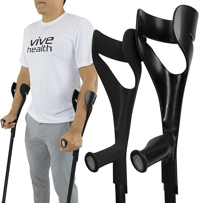 Forearm crutches in black shown in use by a person and as a standalone pair with open cuff and ergonomic grip handles