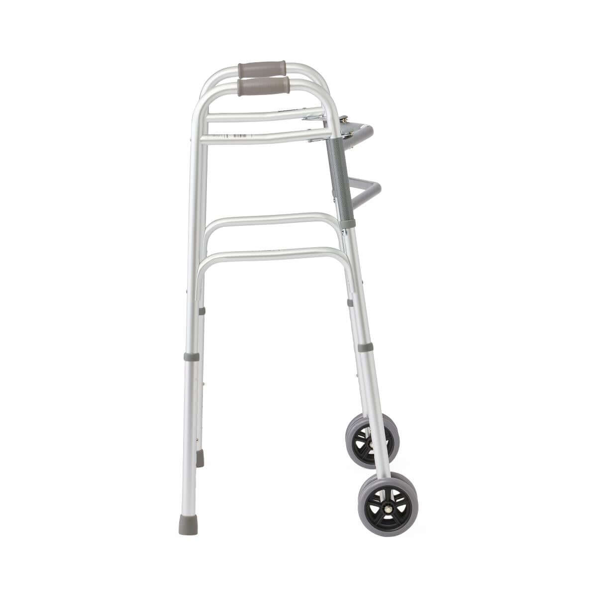Folding walker with front wheels, gray padded handles, adjustable legs, and rubber tips on a white background