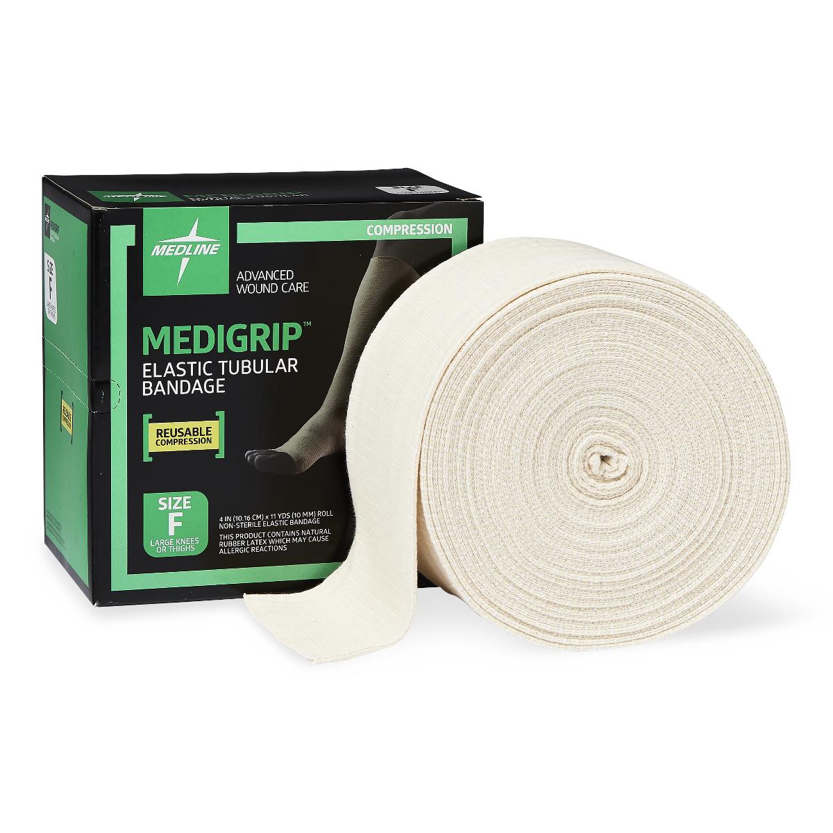 Elastic tubular bandage roll in cream fabric beside its black and green Medline Medigrip box, Size F for large knees or