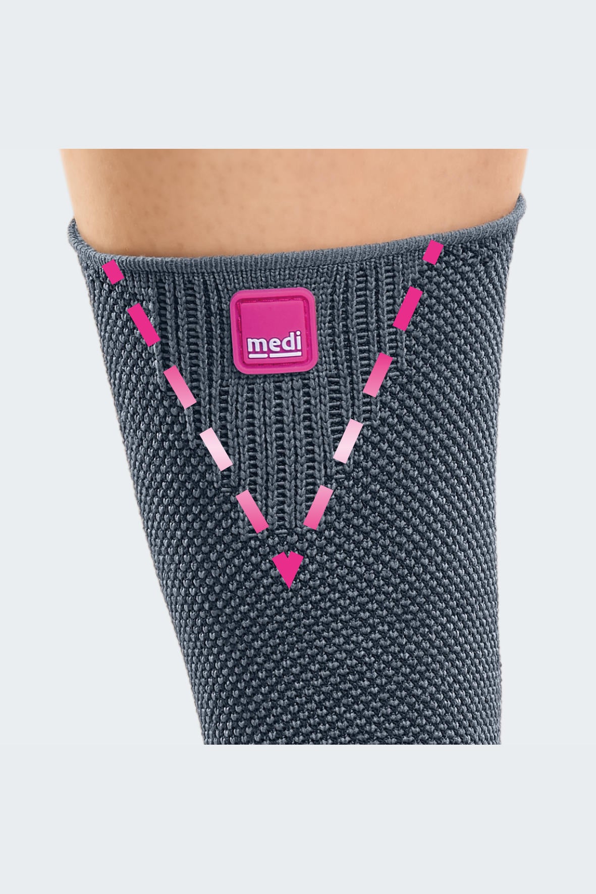 Achimed ankle support in gray knit fabric with pink Medi logo badge, worn on lower leg, shown from behind