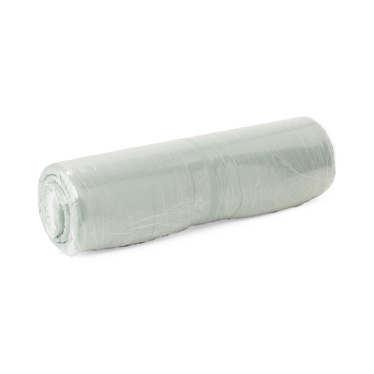 Foam mattress rolled and wrapped in clear plastic packaging, light green color, cylindrical shape on white background