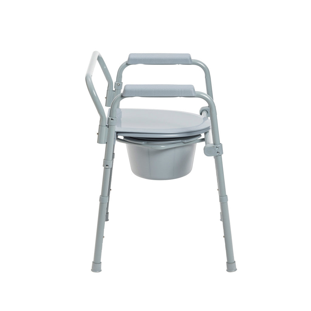 Folding bedside commode with gray steel frame, padded armrests, open seat, and removable bucket with splash guard