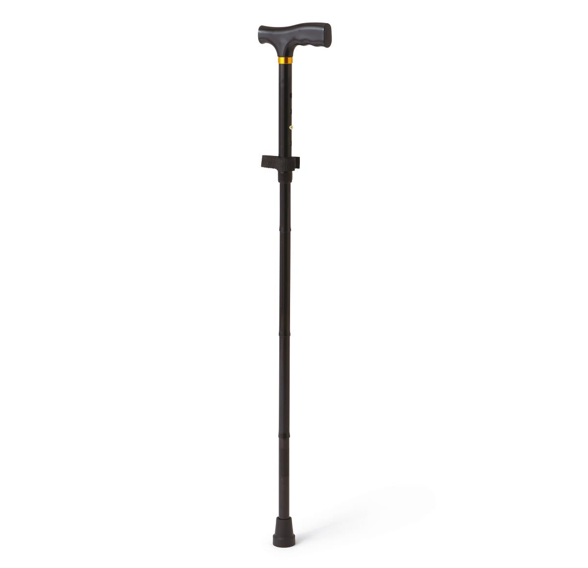 Folding aluminum cane with black comfort grip T-handle, gold collar, wrist strap, and rubber tip against white background