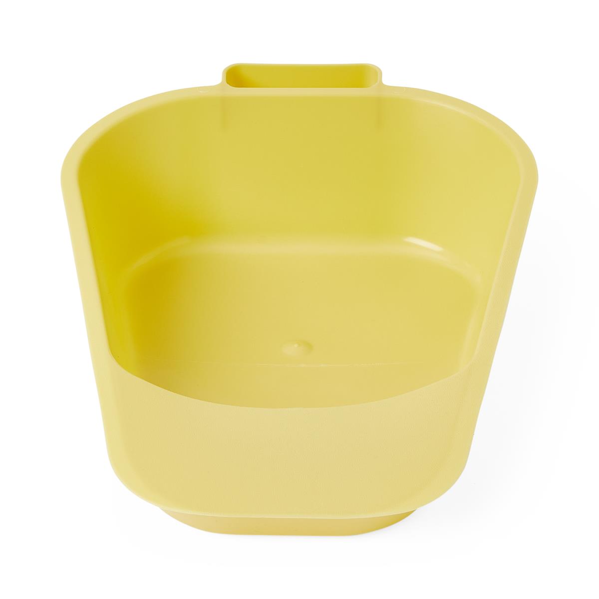 Fracture bedpan in yellow plastic with a low-profile shallow design and integrated handle, viewed from above at an angle