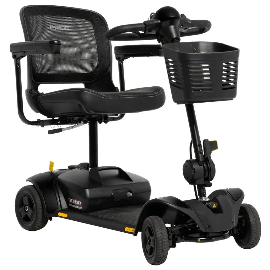 Power mobility scooter in all-black finish with mesh seat back, padded seat, tiller steering, front basket, and four wheels