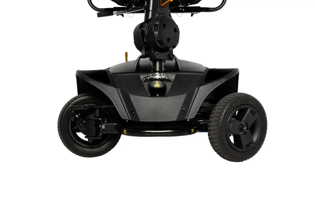 Power scooter front and rear wheel base with black plastic shroud, tiller stem, and caution label, shown against white