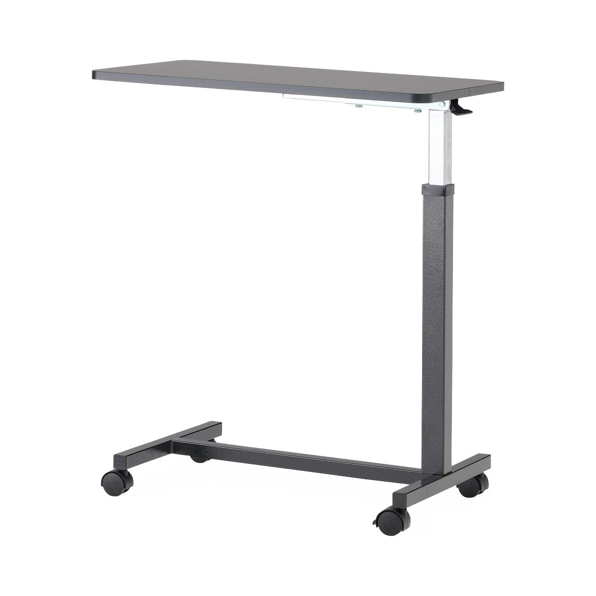 Overbed table with dark rectangular tray top, adjustable center post, H-base frame, and four rolling casters, shown in dark