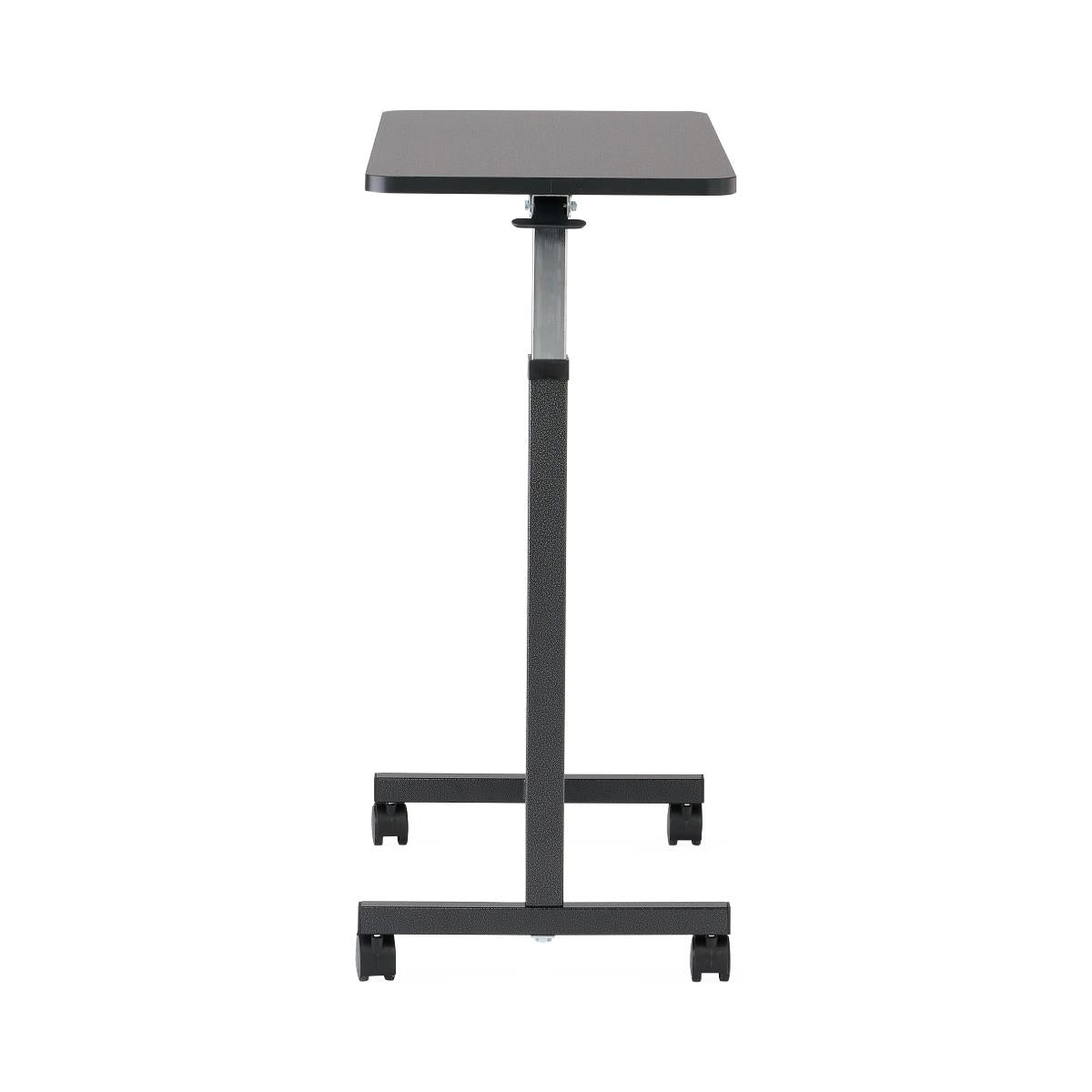Overbed table with black rectangular tray top, adjustable height post, cross-base frame, and four rolling casters