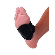 Arch support wrap in black neoprene worn on the sole of a bare foot, viewed from below