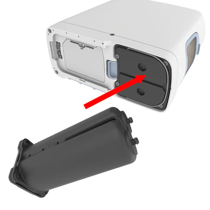 Sieve bed column pair for portable oxygen concentrator shown removed from white device with red arrow indicating