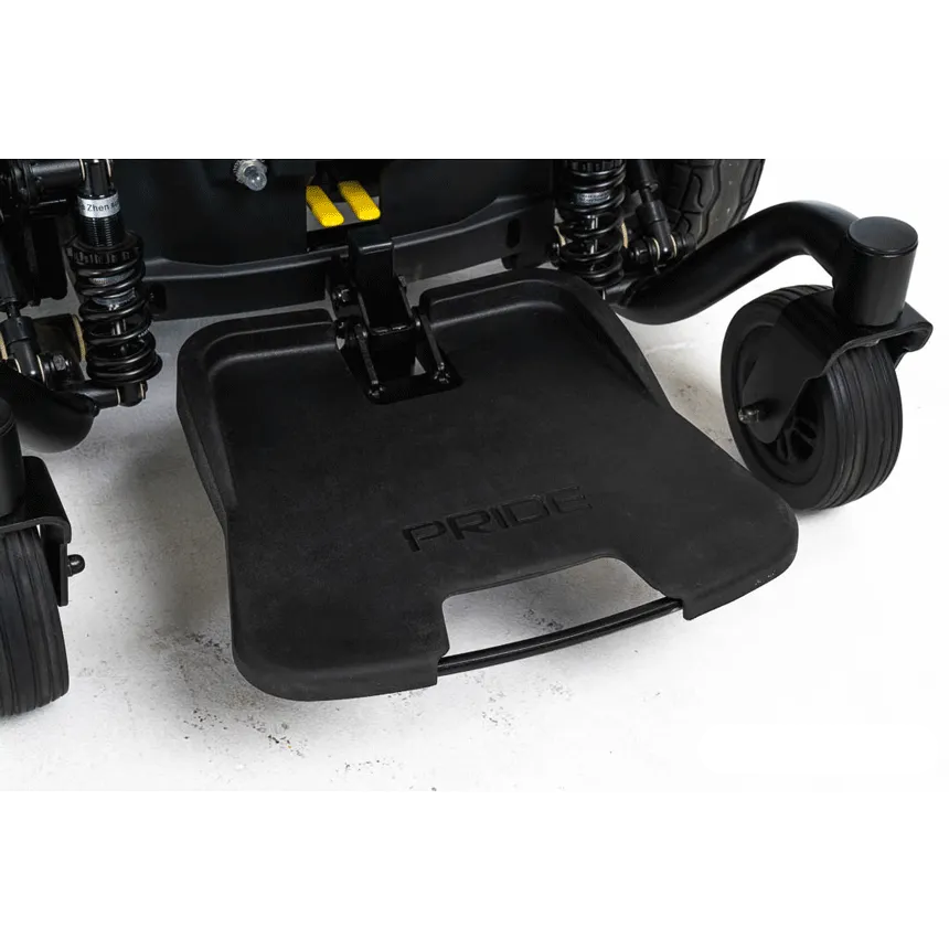 Power wheelchair footrest platform and front suspension assembly with coil springs and small caster wheels, Pride branding