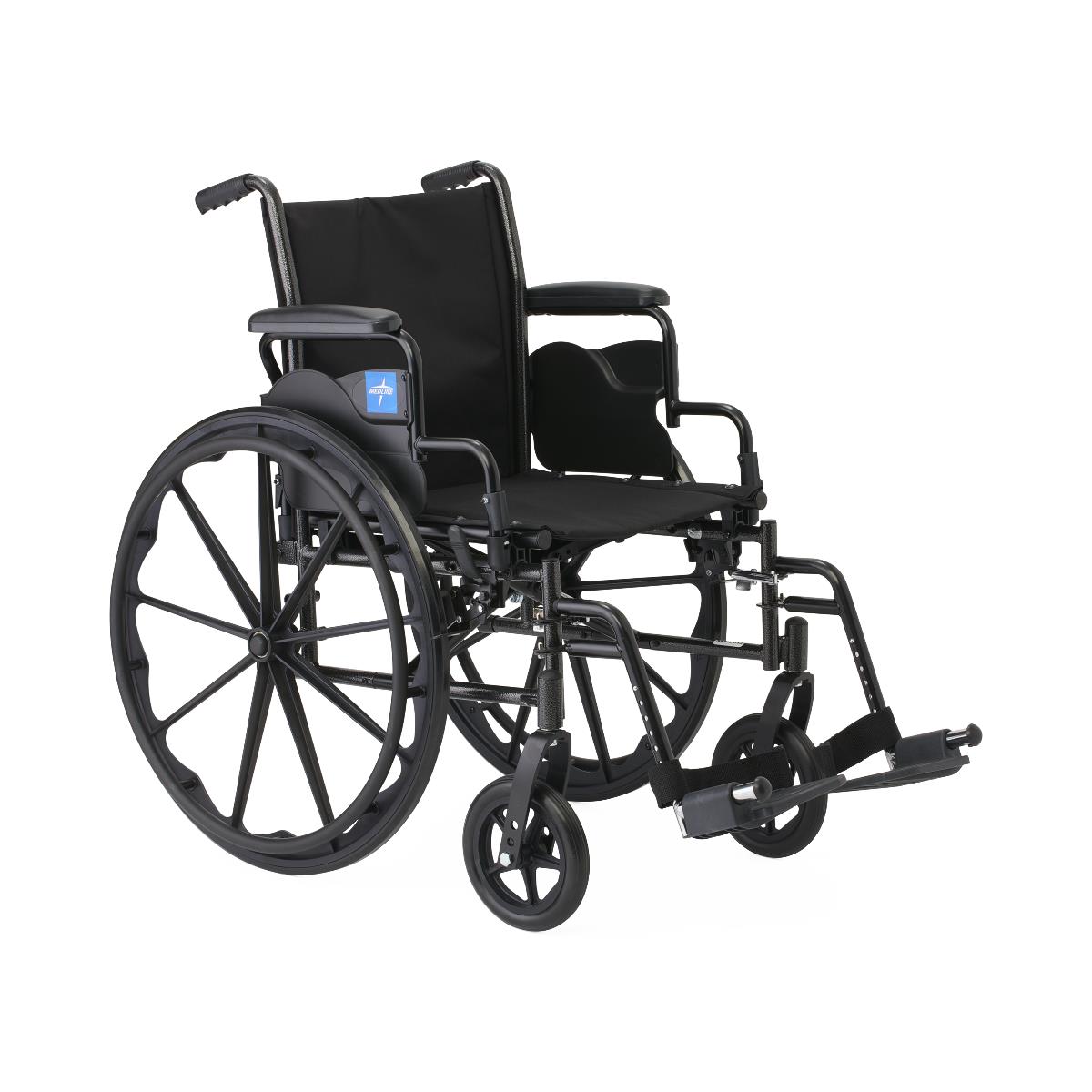 Wheelchair with black nylon upholstery, padded armrests, swing-away footrests, and large rear wheels, shown at an angle