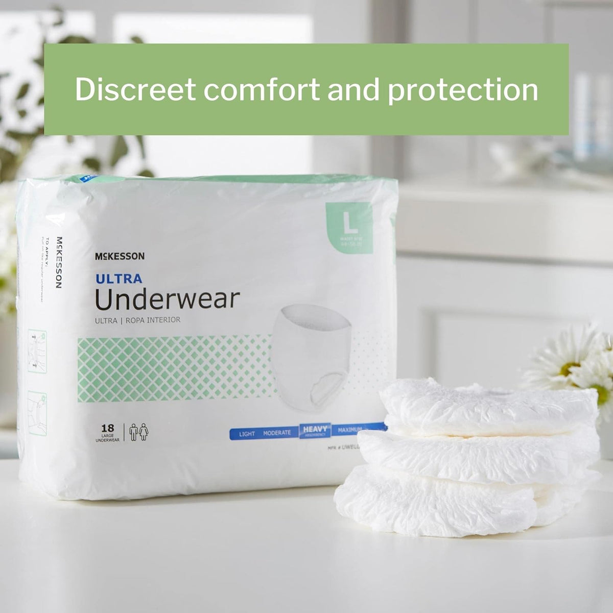 McKesson Ultra absorbent pull-on underwear package in size large beside a folded stack of individual underwear