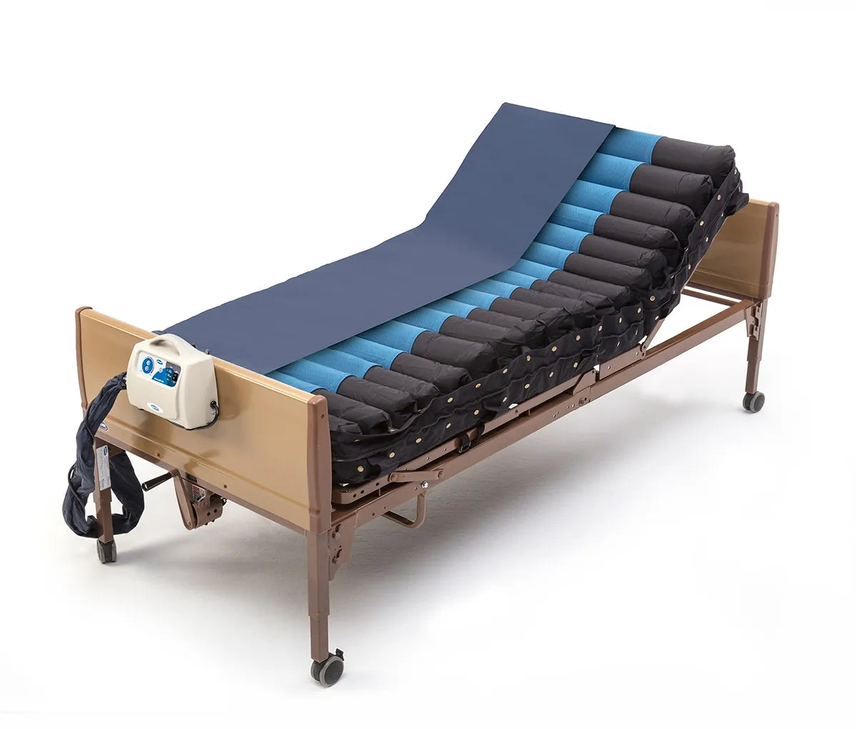 Alternating pressure LAL mattress with blue and gray air cells on a hospital bed frame with electric pump unit attached to