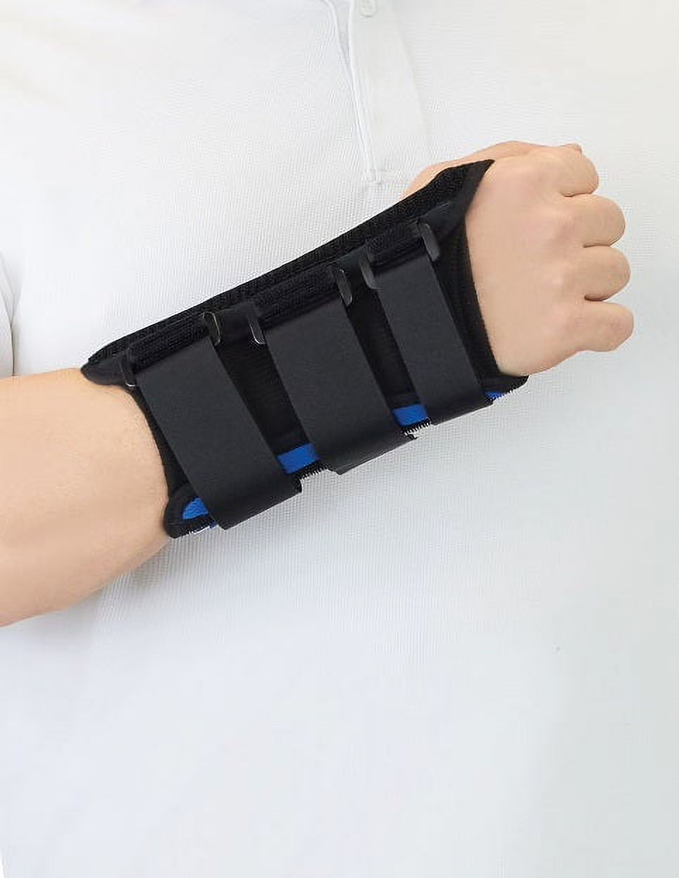 Wrist and thumb brace in black with blue accents and three hook-and-loop straps, worn on a right hand and forearm
