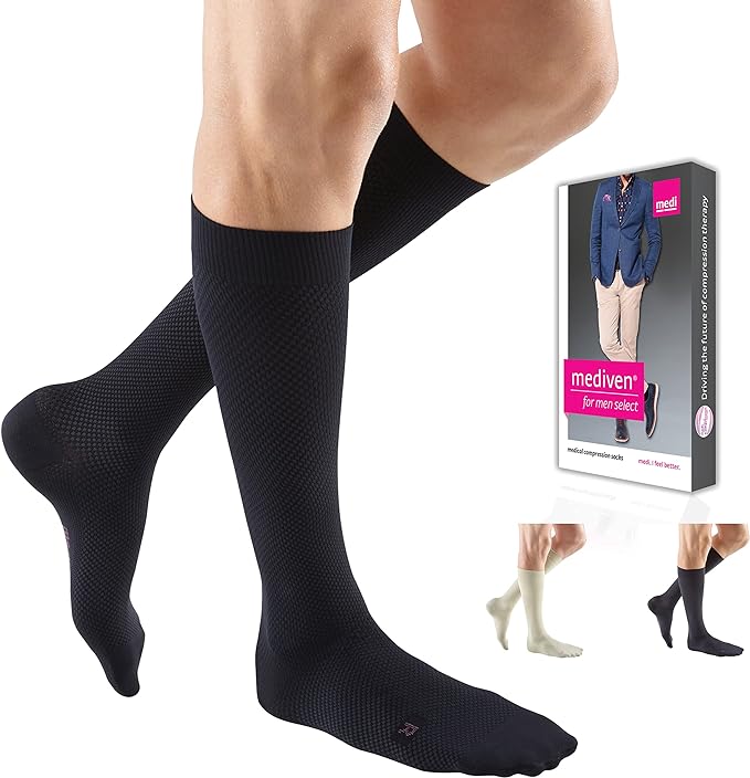 Men's knee-high compression socks in black with textured knit pattern, shown on legs beside Mediven for Men Select product