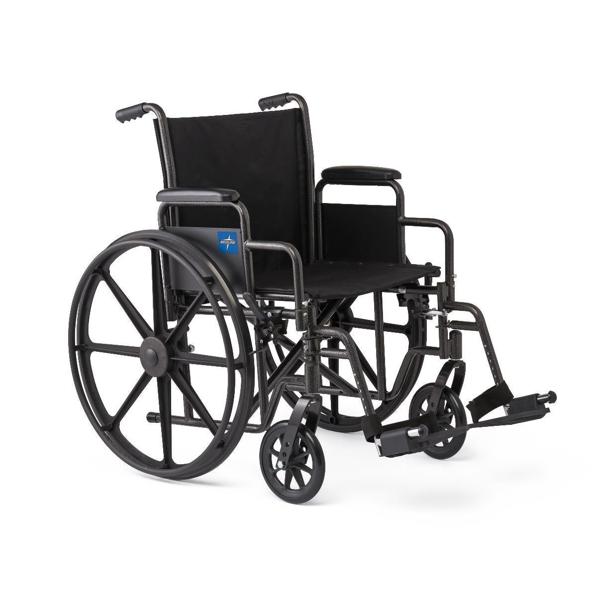 Wheelchair with black steel frame, removable desk-length arms, swing-away footrests, and large rear wheels with hand rims