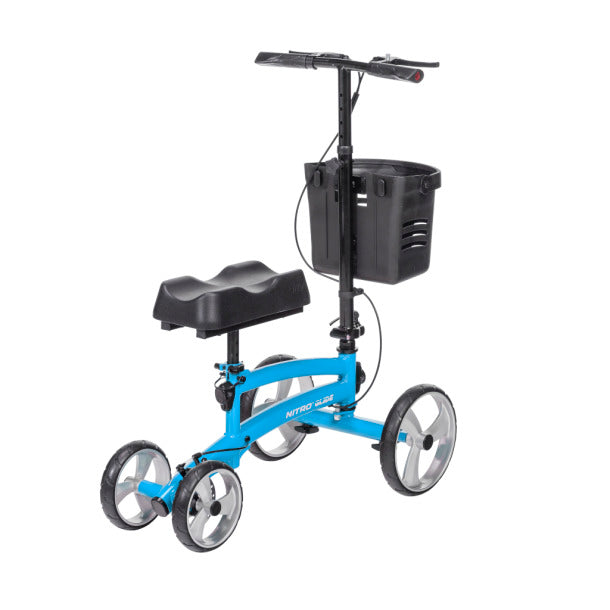 Knee walker with bright blue frame, padded knee rest, handlebar with hand brakes, front basket, and four large wheels