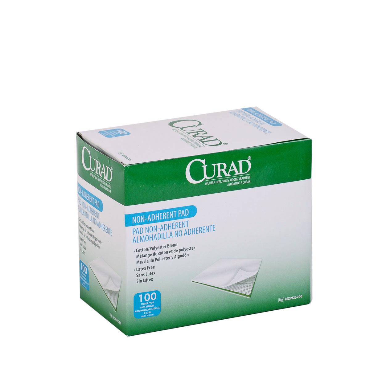 Non-adherent sterile pad box by Curad, green and white packaging, 100-count, with a sample pad shown at front corner